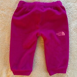 Hot pink baby The North Face pants.
